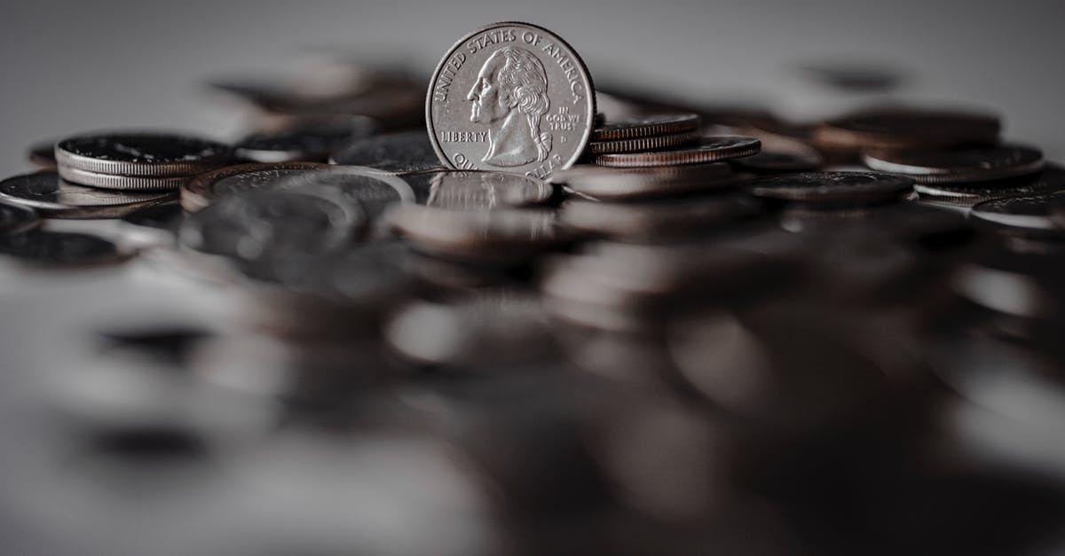 Where to convert USD to AUD for maximum benefit? - Silver Round Coins on Brown Wooden Surface Where to convert USD to AUD for maximum benefit? - Silver Round Coins on Brown Wooden Surface