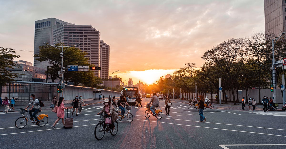 Where to get travel advisories for Taiwan? - People Riding Bicycles on Road Where to get travel advisories for Taiwan? - People Riding Bicycles on Road