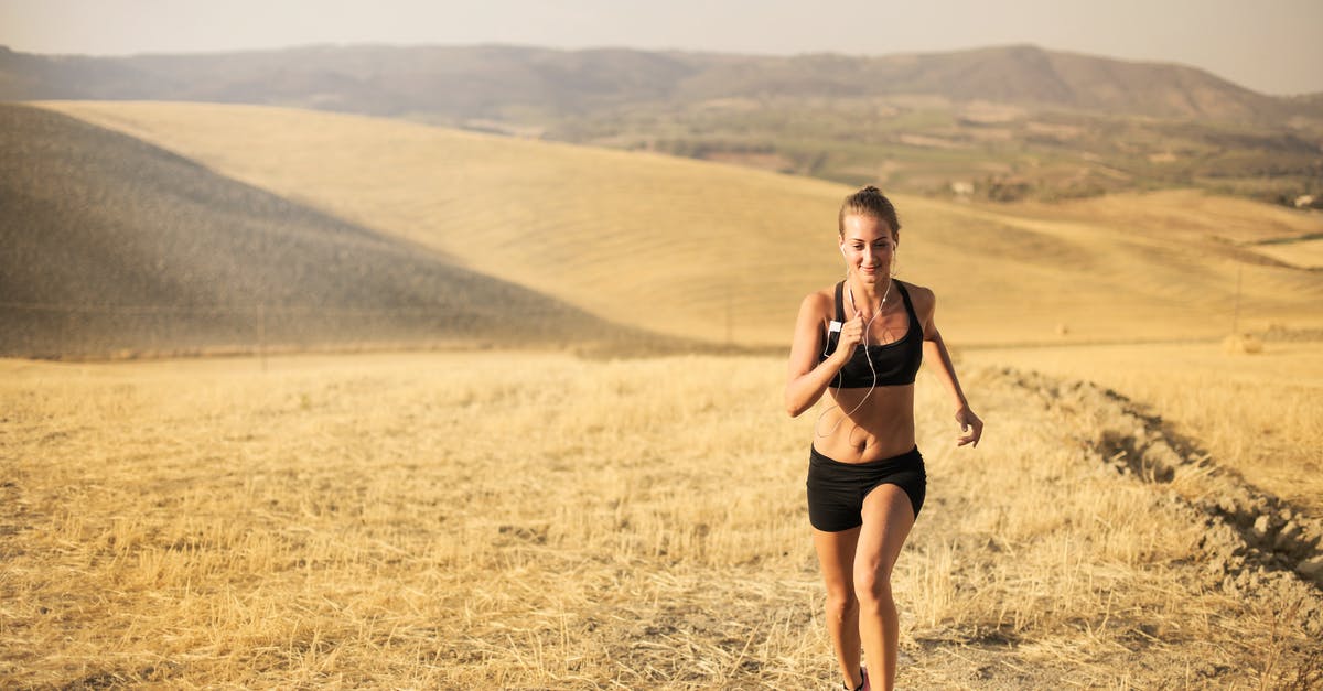 Where to practice violin 5 hours every day in Paris? - Happy young woman running in field Where to practice violin 5 hours every day in Paris? - Happy young woman running in field