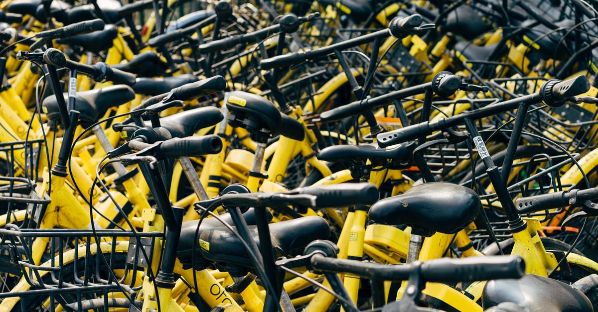 Where to rent electric/motorized bicycles for bicycling on Beausoleil Island? [closed] - Close-up Photo of Yellow Bike Lot