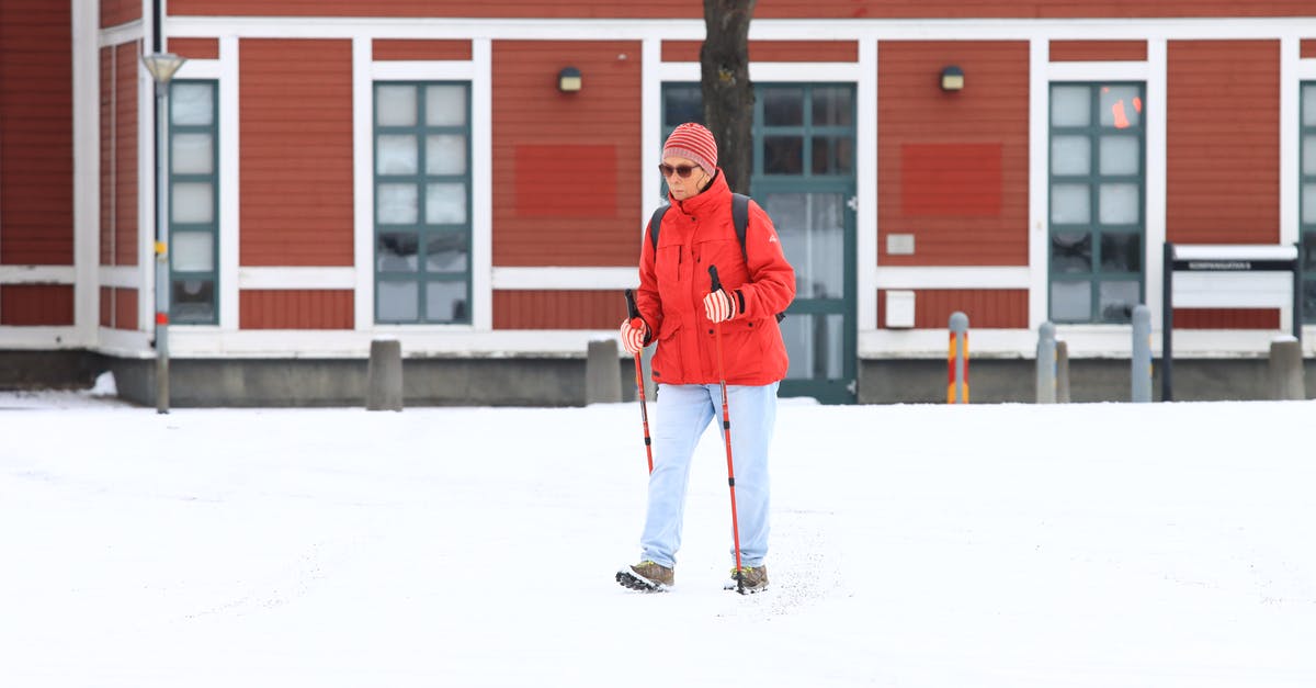 Where to store my luggage while hiking on Kings Trail, Sweden - Man in Red Jacket and Blue Denim Jeans Standing on Snow Covered Ground Where to store my luggage while hiking on Kings Trail, Sweden - Man in Red Jacket and Blue Denim Jeans Standing on Snow Covered Ground