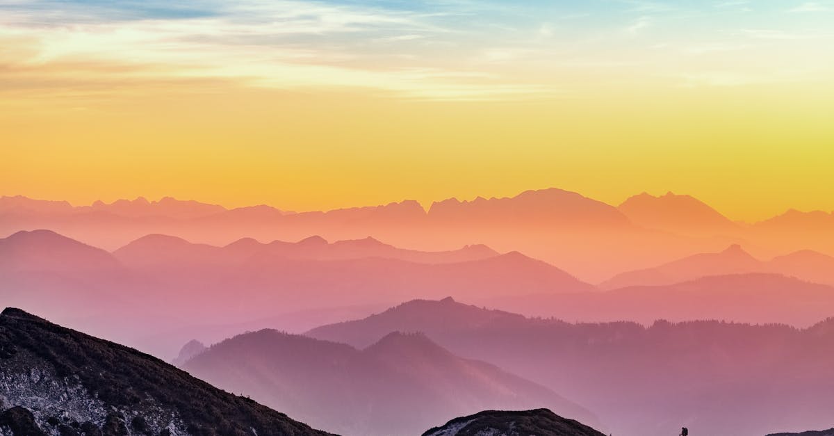 Where was this photograph used as a Windows 10 wallpaper taken? [duplicate] - Silhouette Of Mountains