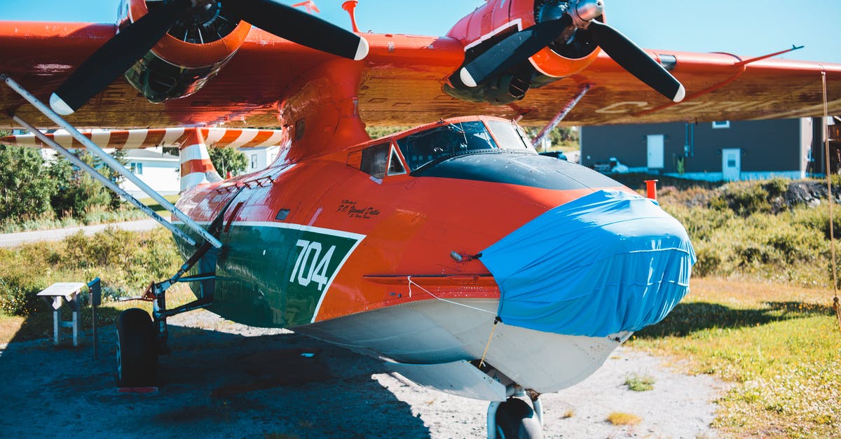 Which airport has direct flights to the most countries? - Modern red airplane parked on airfield Which airport has direct flights to the most countries? - Modern red airplane parked on airfield