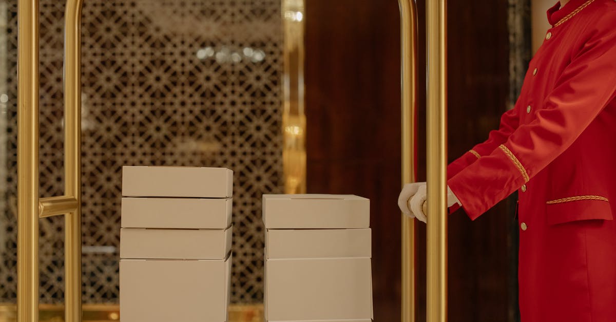 Which apps help to find unconventional accommodation? - Man Pushing Cart with White Boxes Which apps help to find unconventional accommodation? - Man Pushing Cart with White Boxes