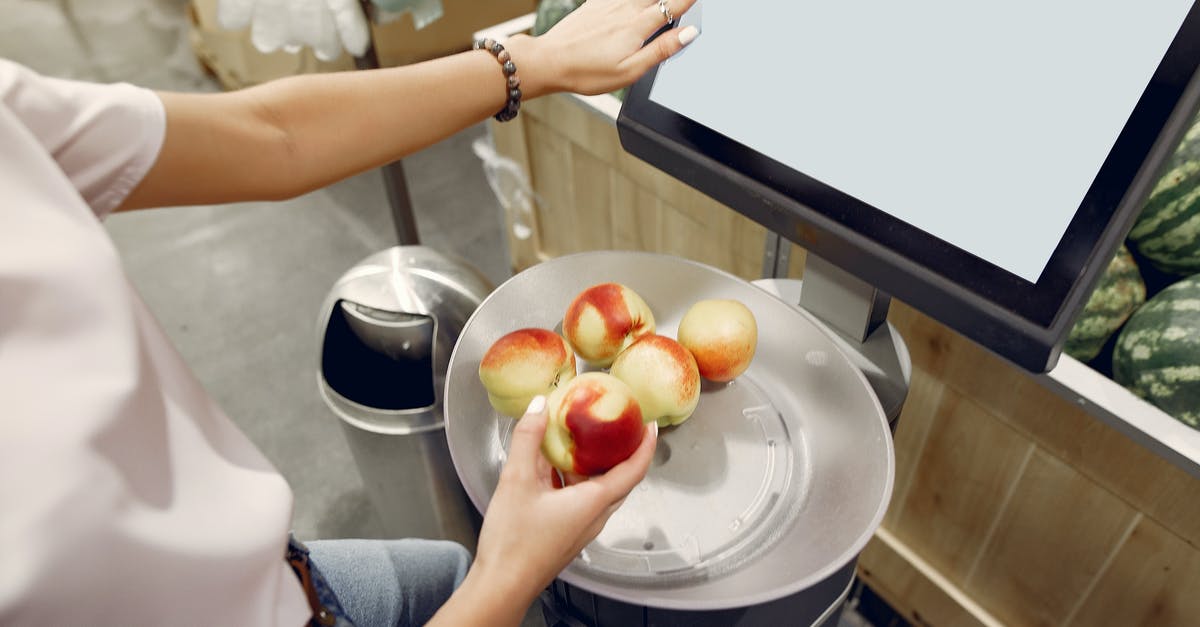Which biometrics do UK border control store when EU citizens scan their passport at airport (both entering and leaving, from/to Europe) - From above of unrecognizable woman touching screen of electronic scales and putting peaches while weighing peaches on scales in contemporary supermarket