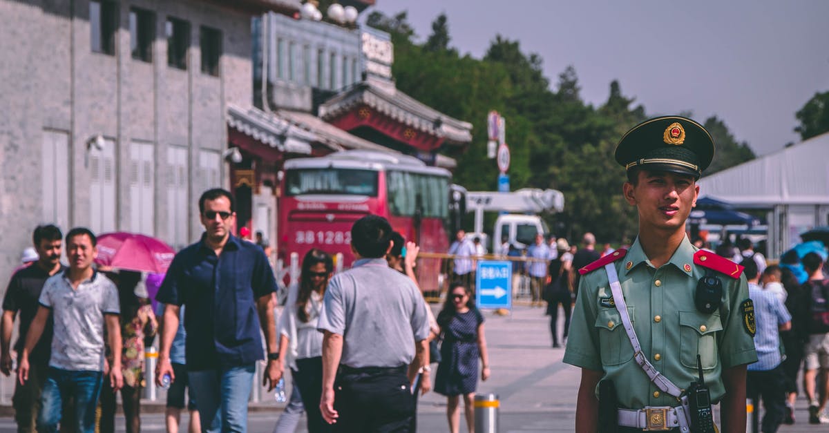 Which cities should I visit in China to feel and live the three kingdoms era? [closed] - People on Street Standing