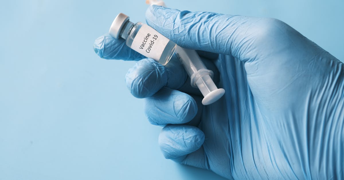 Which countries are denying entry for people with mixed COVID-19 vaccines? - Person Holding A Vial Of Covid 19 Vaccine and Syringe Which countries are denying entry for people with mixed COVID-19 vaccines? - Person Holding A Vial Of Covid 19 Vaccine and Syringe