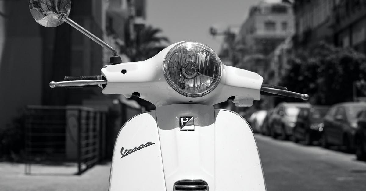 Which is faster for commuting, kick scooter or skateboard? [closed] - Grayscale Photo of a Vespa Lx Scooter