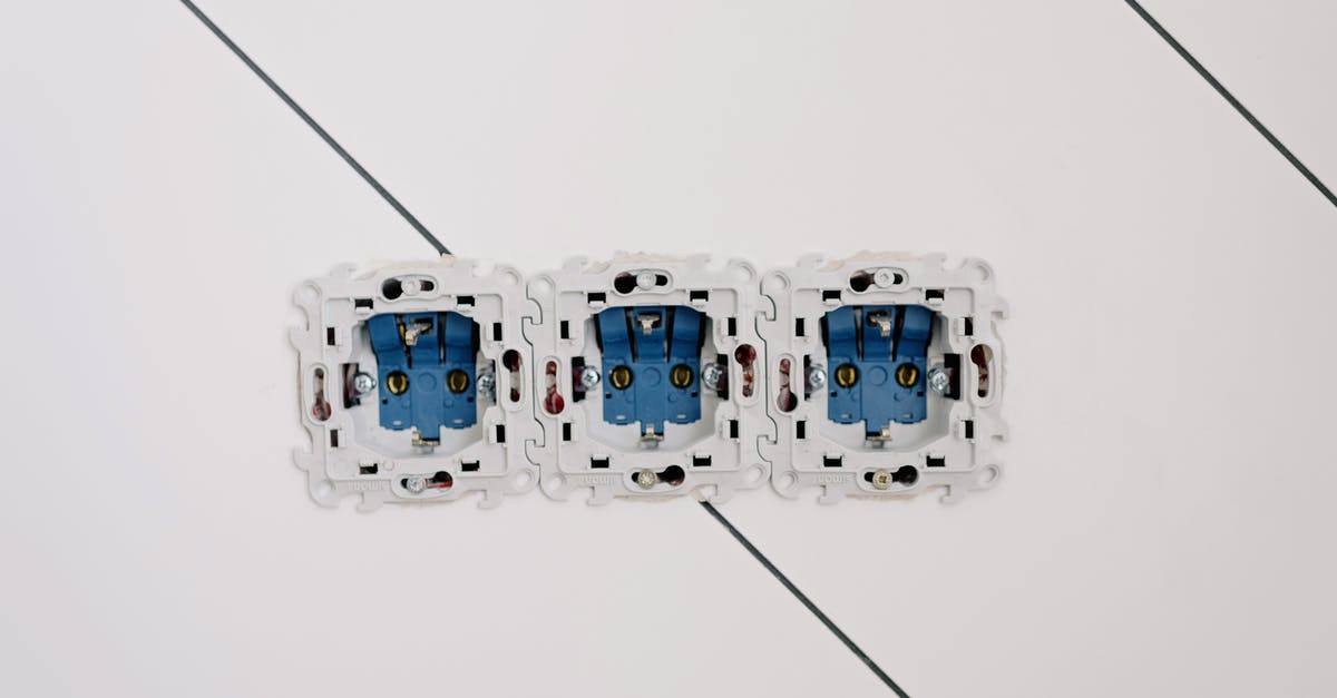Which kind of appliances can one connect to electric sockets located in an airplane's toilet? - Opened power sockets on white wall Which kind of appliances can one connect to electric sockets located in an airplane's toilet? - Opened power sockets on white wall
