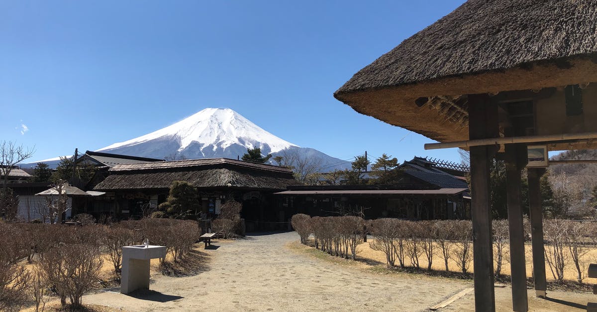 Which months in Japan lowers probability of natural disaster? - Brown Wooden House Near Mountain Under Blue Sky Which months in Japan lowers probability of natural disaster? - Brown Wooden House Near Mountain Under Blue Sky