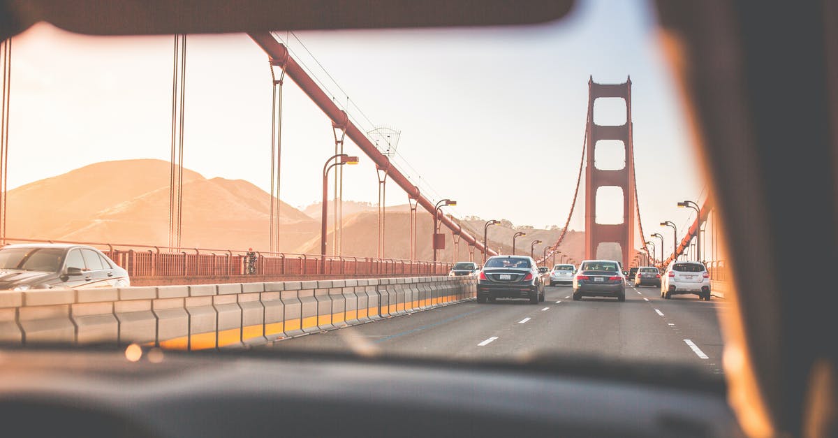 Which parts of Highway 1 are closed at the moment and how to drive around them? - Black Cars on Golden Gate Bridge at Daytime