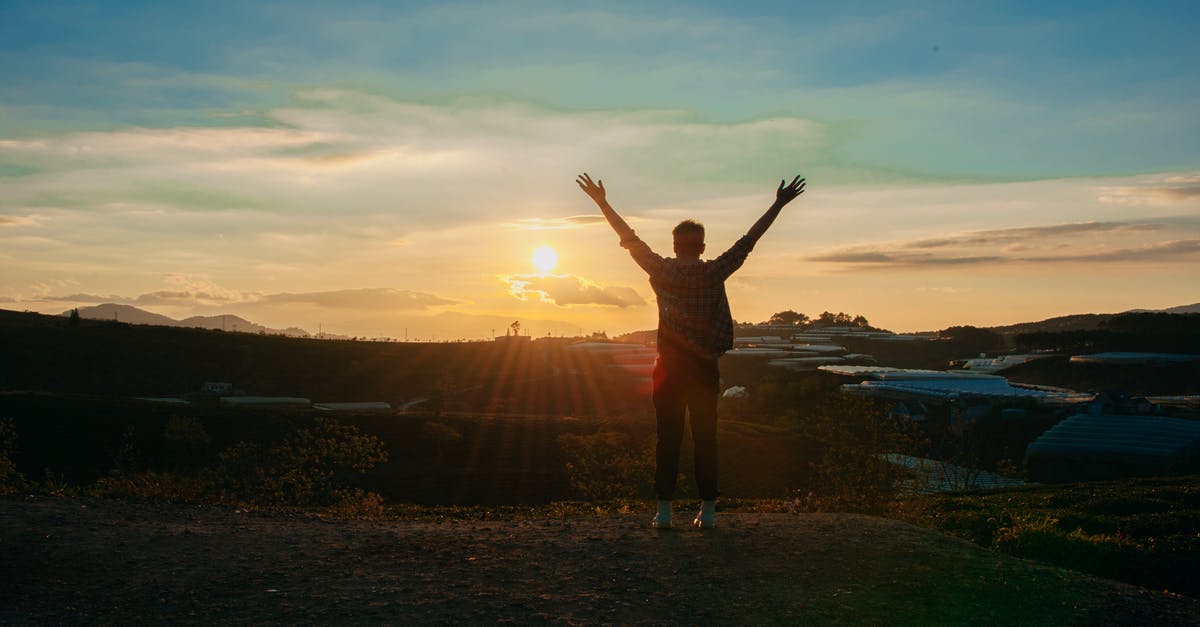 Which "travel vaccinations" are available for free with the NHS in the UK? - Photography of Man Raising Both Hands
