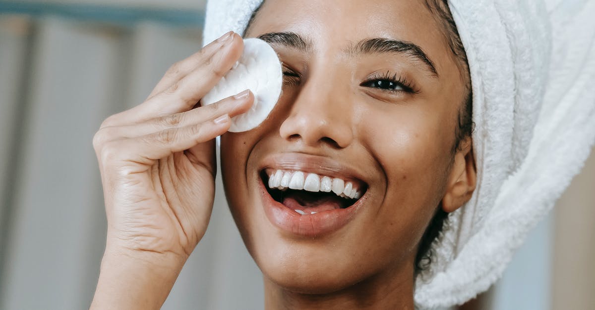 Which Schengen visa do I need to apply for? - Cheerful ethnic female wrapped in towel turban moisturizing face with lotion while smiling happily Which Schengen visa do I need to apply for? - Cheerful ethnic female wrapped in towel turban moisturizing face with lotion while smiling happily