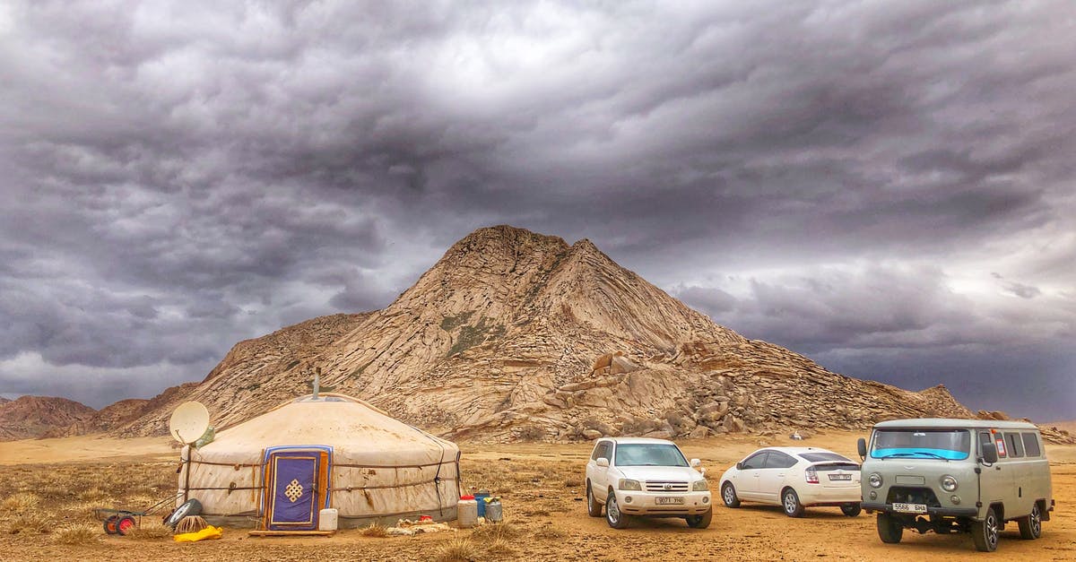 Which travellers in Mongolia have to register, and how? - Three Vehicles Beside Mountain Under Cloudy Sky Which travellers in Mongolia have to register, and how? - Three Vehicles Beside Mountain Under Cloudy Sky