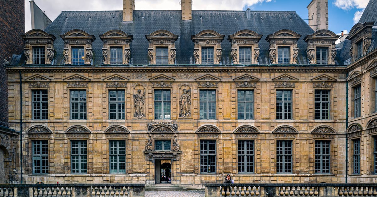 Which type of transport tickets for 4 days: IDF or Paris Pass? - Photo Of Brown Building During Daytime Which type of transport tickets for 4 days: IDF or Paris Pass? - Photo Of Brown Building During Daytime