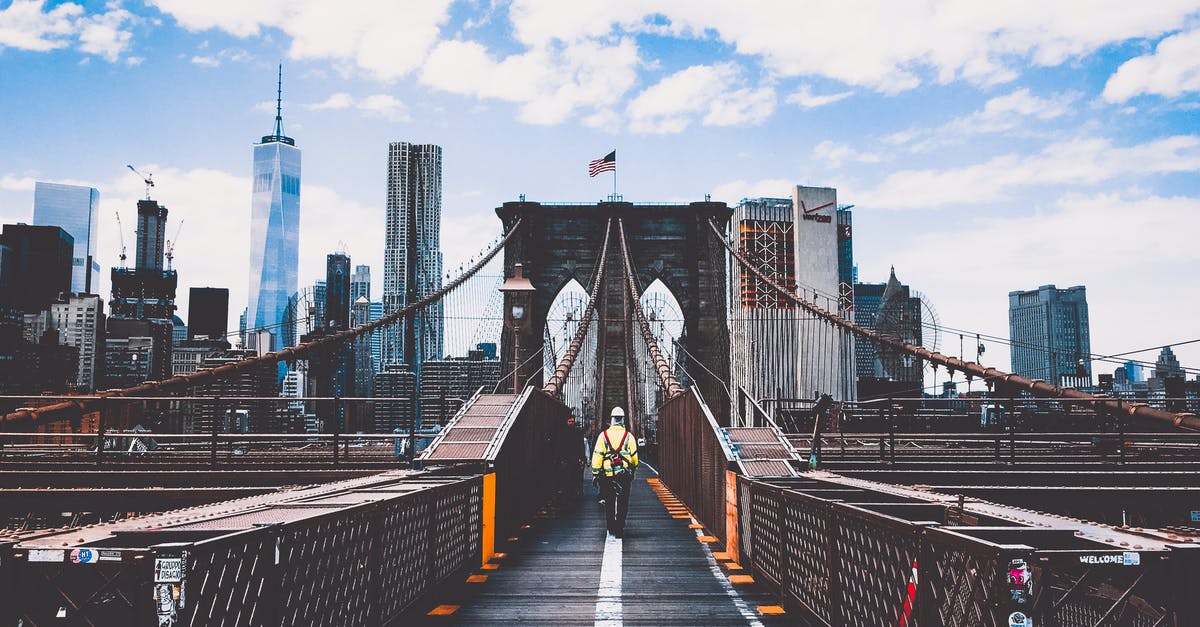Which vaccinations do I need to travel South America extensively? - Man Walking on Bridge Which vaccinations do I need to travel South America extensively? - Man Walking on Bridge