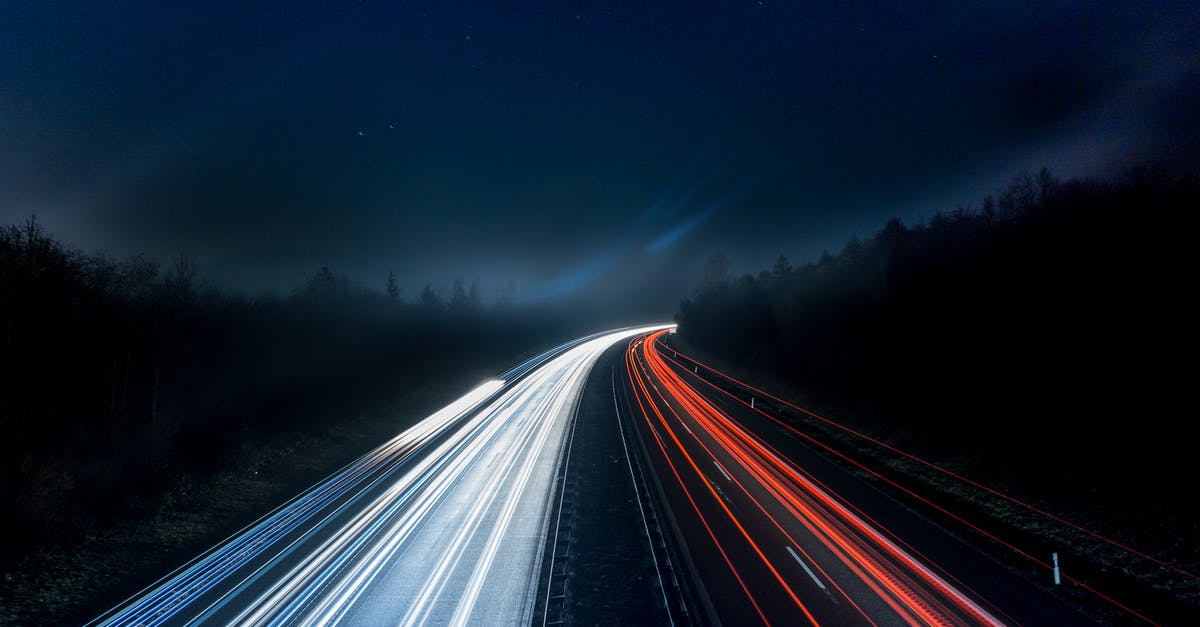 Why are California freeway exits painted with disconnected shoulder lines? - Light Trails on Highway at Night Why are California freeway exits painted with disconnected shoulder lines? - Light Trails on Highway at Night