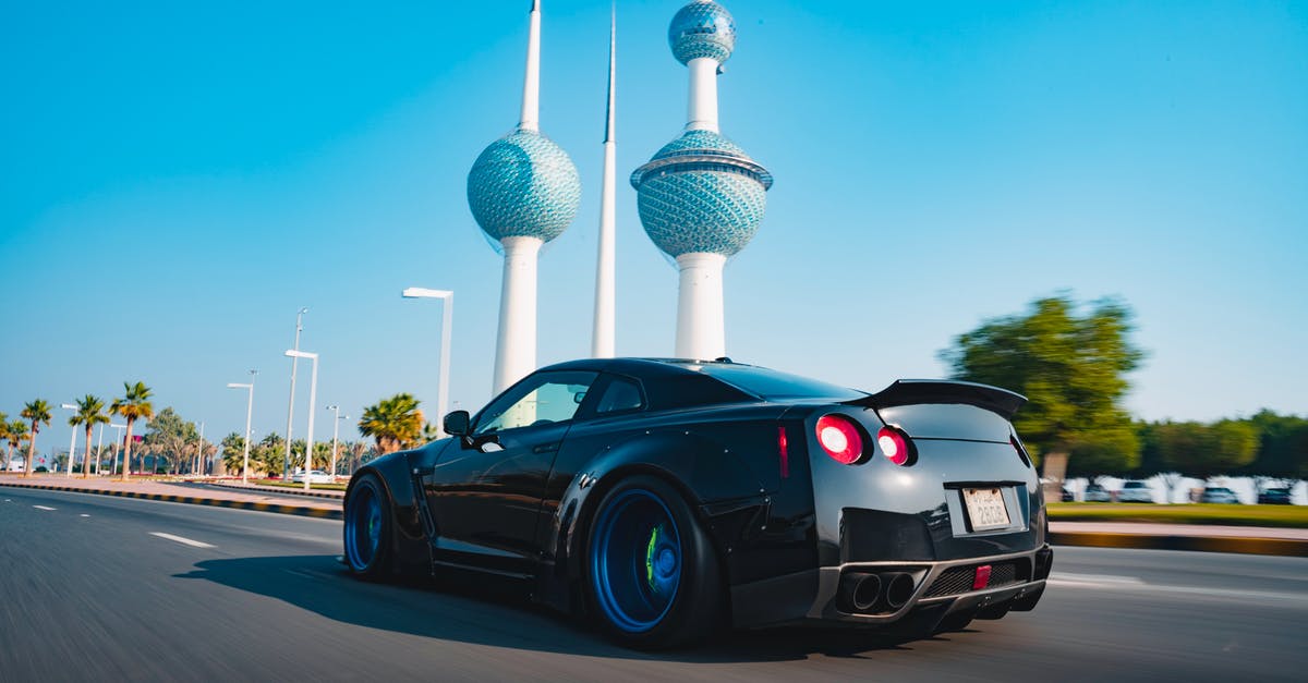 Why are car rentals in Switzerland & Austria so expensive (yet so cheap in Italy)? - Black Porsche 911 Parked Near White Tower Why are car rentals in Switzerland & Austria so expensive (yet so cheap in Italy)? - Black Porsche 911 Parked Near White Tower