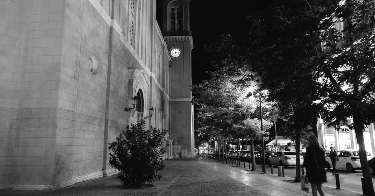 Why are flights departing Athens shorter than their returns at night? [closed] - Grayscale Photo of A Street By Night