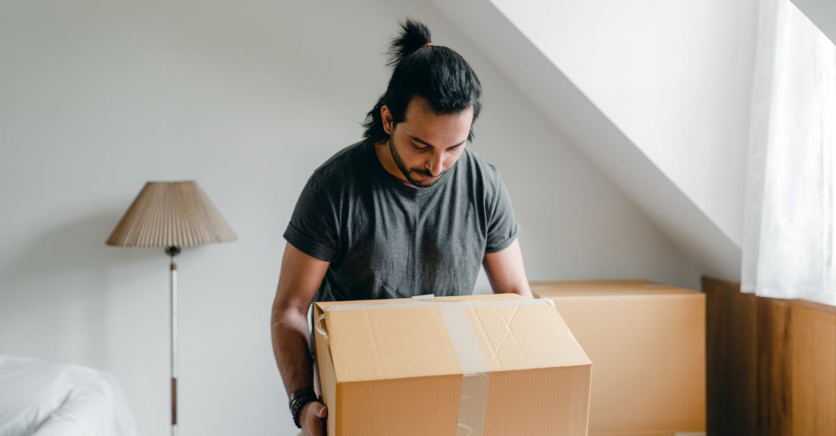 Why are new Eurostar seats harder than the old ones? - Ethnic guy picking up cardboard box in house Why are new Eurostar seats harder than the old ones? - Ethnic guy picking up cardboard box in house