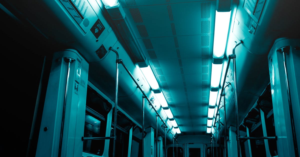 Why are seats near emergency exit on a plane freezing cold? - White Train Bench and Door Why are seats near emergency exit on a plane freezing cold? - White Train Bench and Door