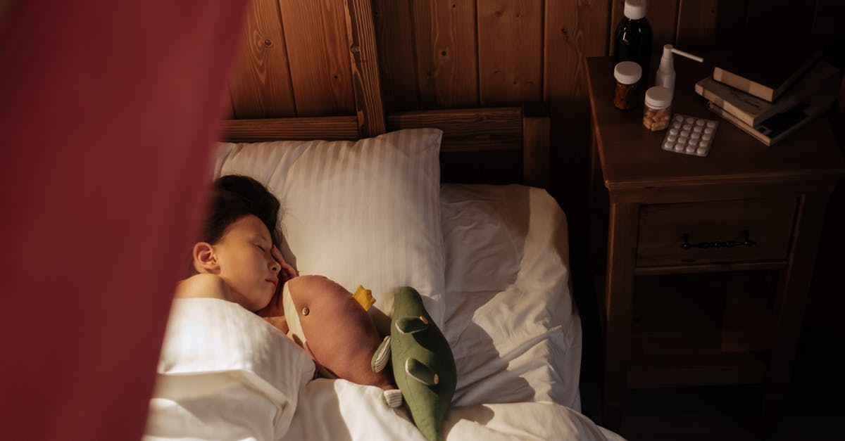 Why are there no 2,3,4,5 tier bunk beds on airplanes? - Girl Sleeping in Bed with Medicine on Nightstand Why are there no 2,3,4,5 tier bunk beds on airplanes? - Girl Sleeping in Bed with Medicine on Nightstand