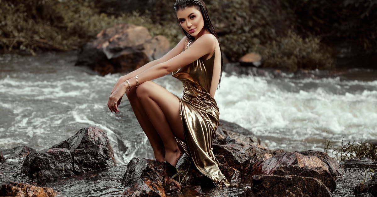 Why did airport security swab my hands with wet paper? - Woman in Gold Gown Sitting on Rock at the River Why did airport security swab my hands with wet paper? - Woman in Gold Gown Sitting on Rock at the River