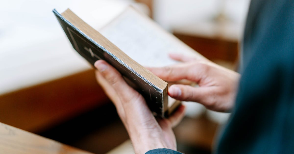 Why do (a lot of) people book airline ticket through agencies? [closed] - Person in Blue Denim Jeans Holding Black Tablet Computer