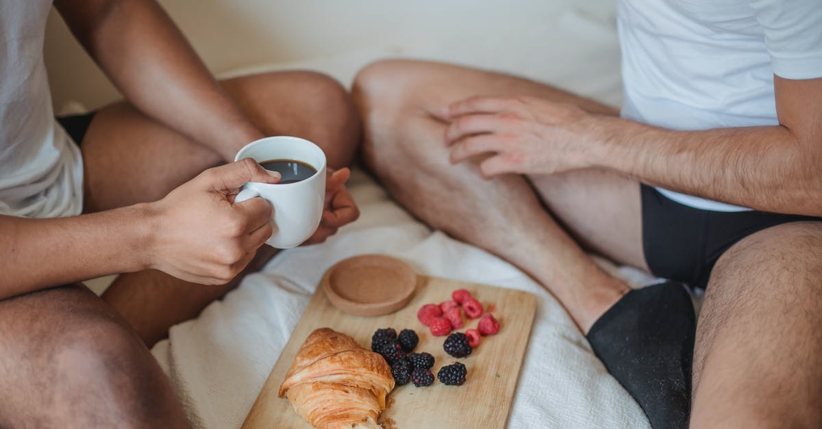 Why do airlines prohibit having two infants in the same row? - Two Unrecognizable Men Sitting on Bed and Having Breakfast Why do airlines prohibit having two infants in the same row? - Two Unrecognizable Men Sitting on Bed and Having Breakfast