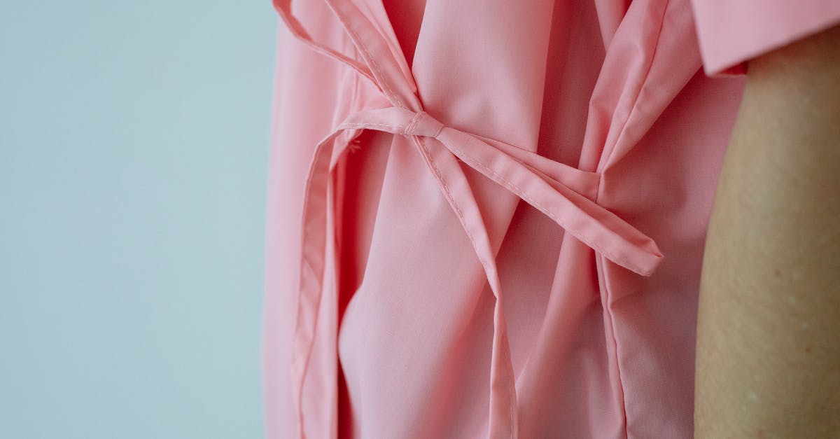 Why do almost all international trains to Russia show as sold out? - Crop unrecognizable female patient in pink gown with pink ribbon standing against white background Why do almost all international trains to Russia show as sold out? - Crop unrecognizable female patient in pink gown with pink ribbon standing against white background