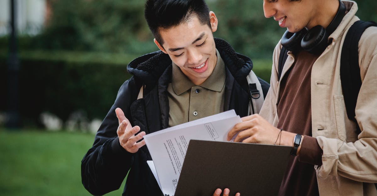 Why do dealers in Vegas check ID even if I look older than 25? [closed] - Multiethnic students reading report in folder together