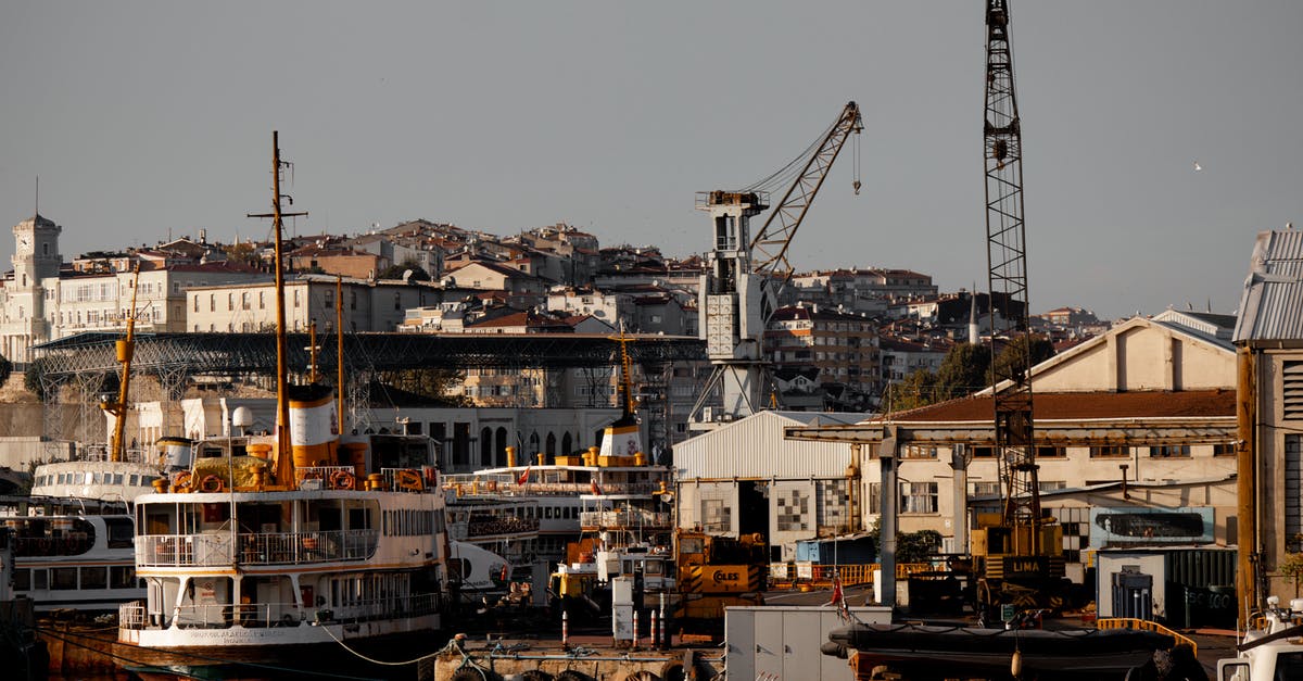 Why do ferries have a trucker's lounge? - Harbour with Ferries and Cranes and Town in Background Why do ferries have a trucker's lounge? - Harbour with Ferries and Cranes and Town in Background