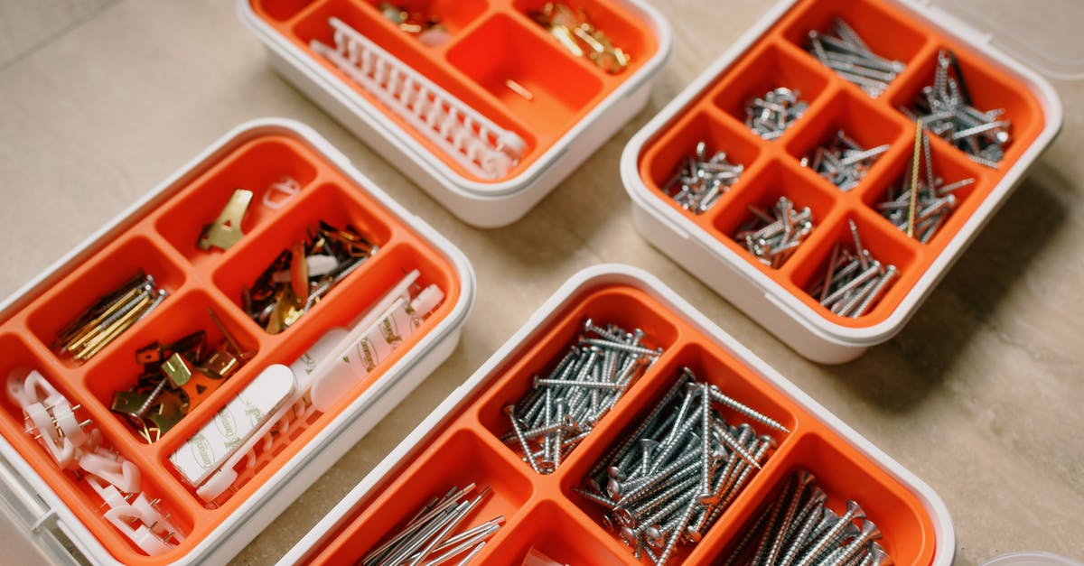 Why do Indian citizens need many visas? - From above of boxes with different metal nails and plastic dowels in workshop Why do Indian citizens need many visas? - From above of boxes with different metal nails and plastic dowels in workshop