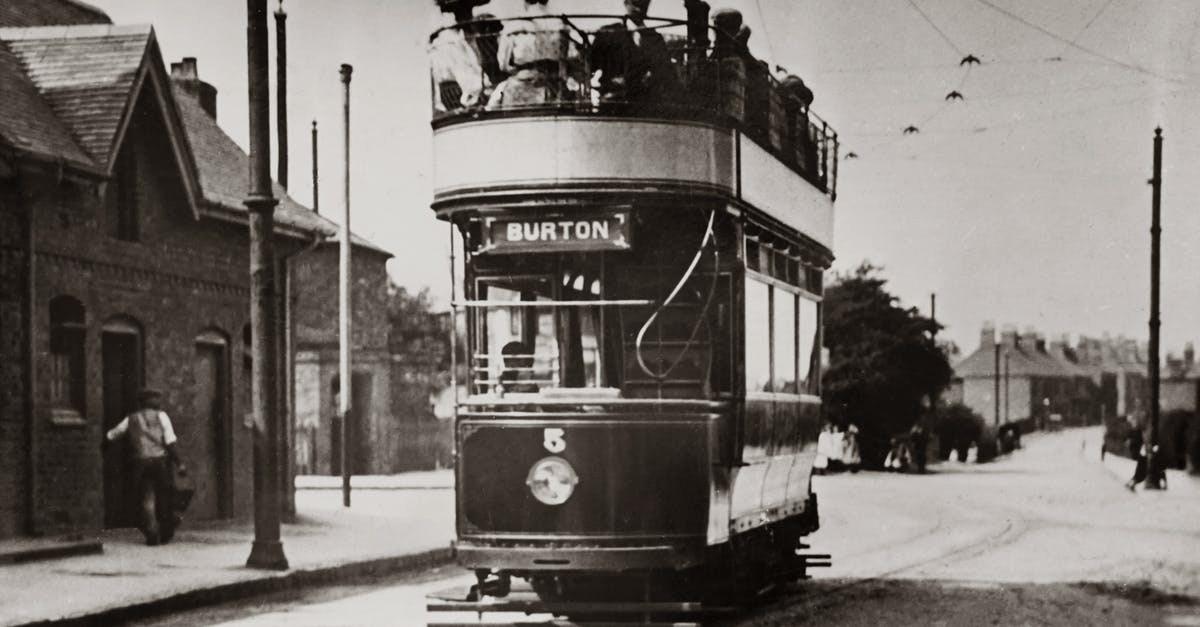 Why do some ferries (like Liverpool to Dublin) only allow passengers with a vehicle? - Grayscale Photo of Double Decker Bus With People Why do some ferries (like Liverpool to Dublin) only allow passengers with a vehicle? - Grayscale Photo of Double Decker Bus With People