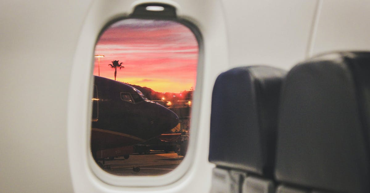 Why do some planes have flashing lights within the plane cabin? - White Commercial Plane Window Why do some planes have flashing lights within the plane cabin? - White Commercial Plane Window