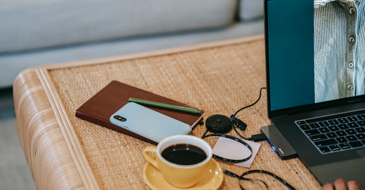 Why does my laptop charger not work with this adapter? - Crop employee working on laptop with photo on screen indoors Why does my laptop charger not work with this adapter? - Crop employee working on laptop with photo on screen indoors