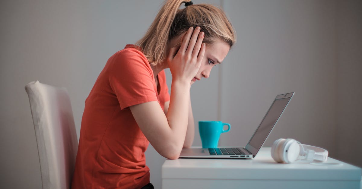 Why does Ryanair do visa check twice? - Young troubled woman using laptop at home Why does Ryanair do visa check twice? - Young troubled woman using laptop at home