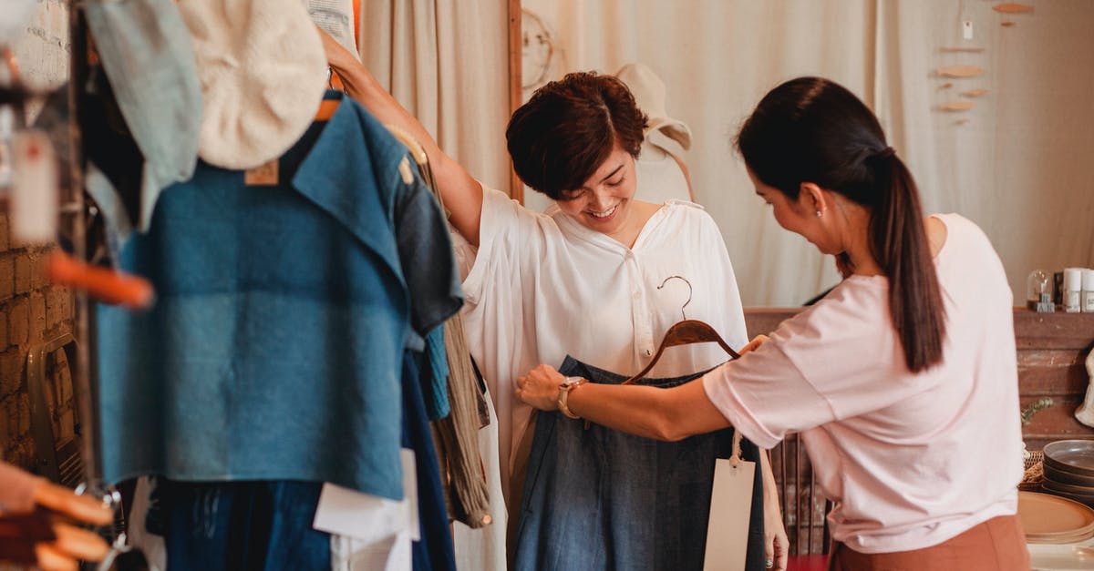 Why does the Eurostar not show youth pricing? - Unrecognizable woman showing clothes to cheerful Asian girlfriend in shop Why does the Eurostar not show youth pricing? - Unrecognizable woman showing clothes to cheerful Asian girlfriend in shop