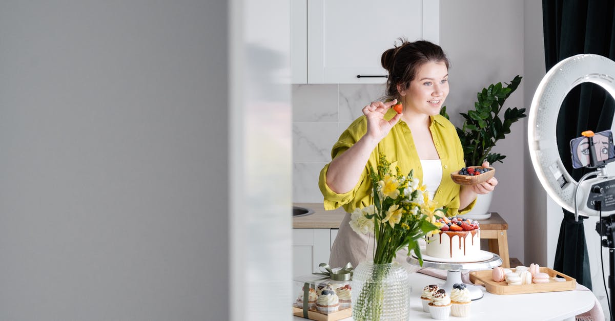 Why does the Eurostar not show youth pricing? - Delighted young female influencer in casual clothes smiling and demonstrating fresh berries while decorating appetizing cake during recording vlog on smartphone in kitchen Why does the Eurostar not show youth pricing? - Delighted young female influencer in casual clothes smiling and demonstrating fresh berries while decorating appetizing cake during recording vlog on smartphone in kitchen