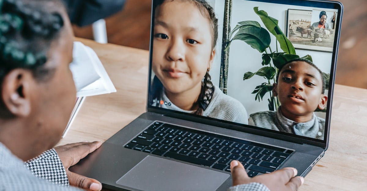 Why does the "job" question in French visit visa application disappear as I answer an earlier question? - Black woman working online with pupils on laptop
