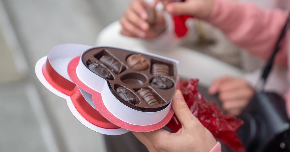 Why don't they give you a sweet on take-off anymore? - Anonymous guy giving sweet candies to girlfriend on street Why don't they give you a sweet on take-off anymore? - Anonymous guy giving sweet candies to girlfriend on street