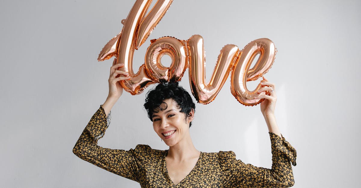 Why has this dress been met with surprise at the Oktoberfest in Munich? - Happy woman with shiny balloon love Why has this dress been met with surprise at the Oktoberfest in Munich? - Happy woman with shiny balloon love