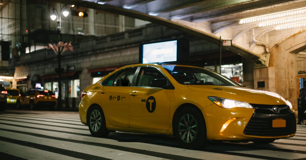 Why is Amtrak so expensive in the Northeastern US? - Expensive yellow taxi car riding on New York City street under illuminated bridge at night Why is Amtrak so expensive in the Northeastern US? - Expensive yellow taxi car riding on New York City street under illuminated bridge at night