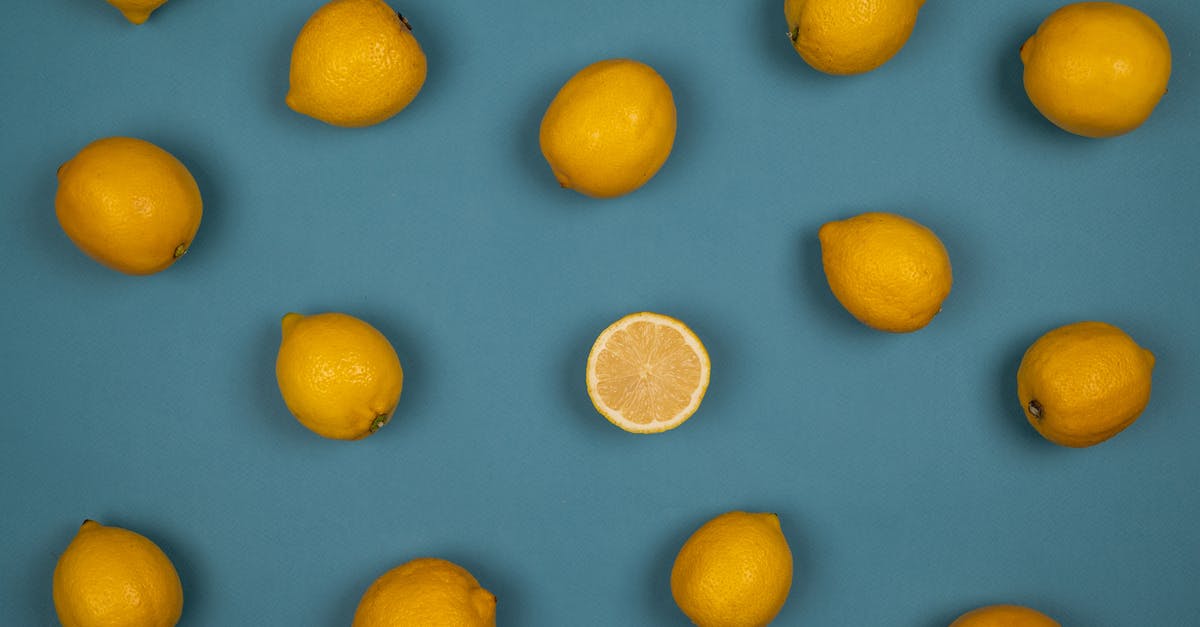 Why is it uncommon to fill airliners from both ends? - Fresh lemons with juicy flesh on blue background Why is it uncommon to fill airliners from both ends? - Fresh lemons with juicy flesh on blue background
