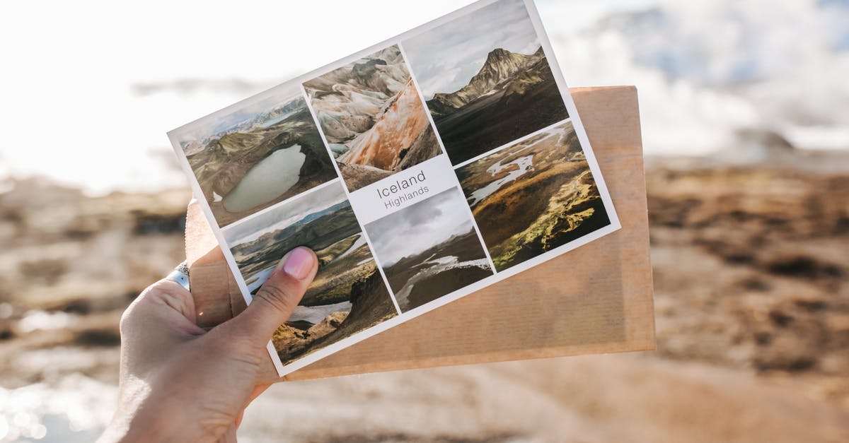 Why was the Iceland ferry discontinued? - Hand of a Person Holding a Postcard Why was the Iceland ferry discontinued? - Hand of a Person Holding a Postcard