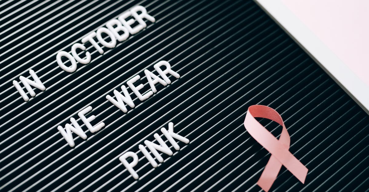 Why were we denied boarding? - A Letter Board with Breast Cancer Awareness Note Why were we denied boarding? - A Letter Board with Breast Cancer Awareness Note