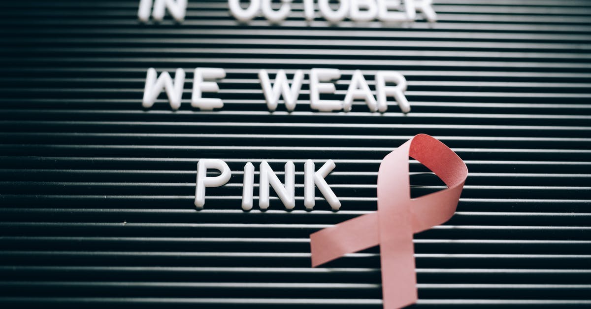 Why were we denied boarding? - A Letter Board with Breast Cancer Awareness Note Why were we denied boarding? - A Letter Board with Breast Cancer Awareness Note