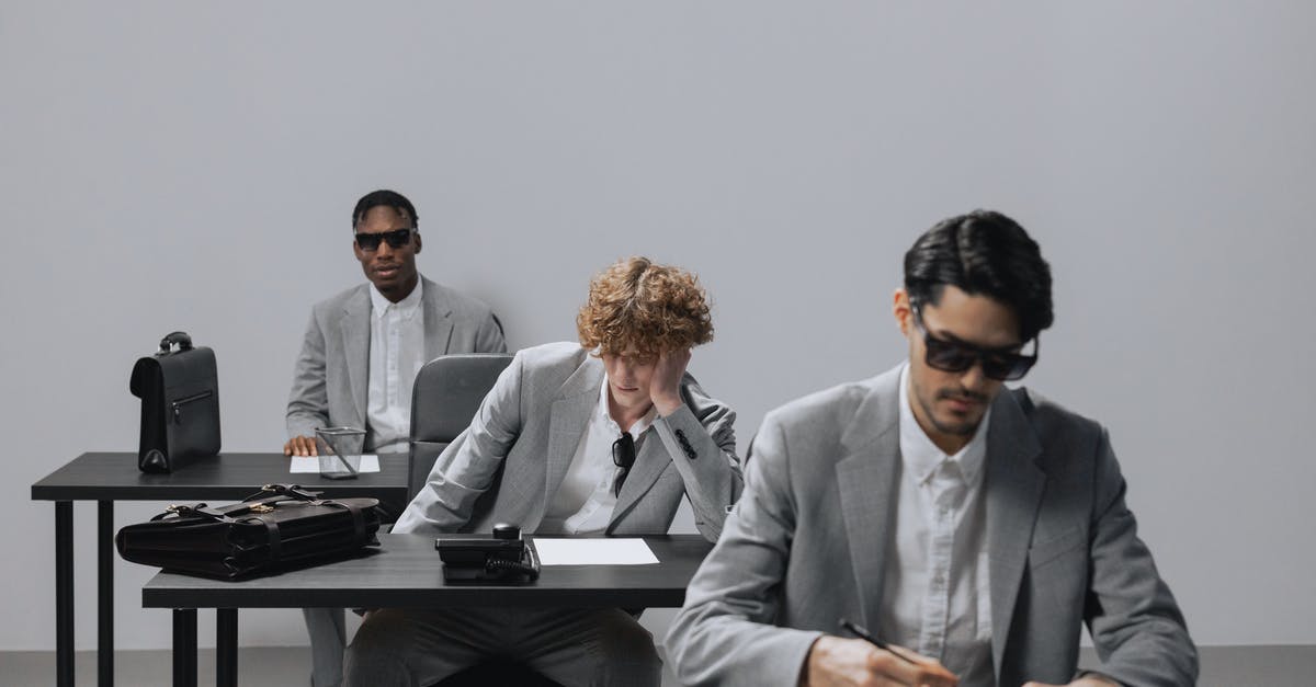 Will a smartcard work alongside a railcard? - Man in Gray Suit Jacket Standing Beside Man in Gray Suit Will a smartcard work alongside a railcard? - Man in Gray Suit Jacket Standing Beside Man in Gray Suit