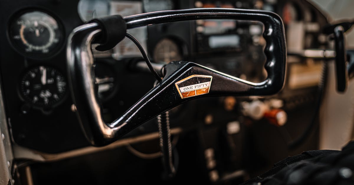 Will Airlines ever stop the pre-flight safety briefs? [closed] - Closeup of steering wheel and instrument panel in cockpit of retro basic trainer aircraft