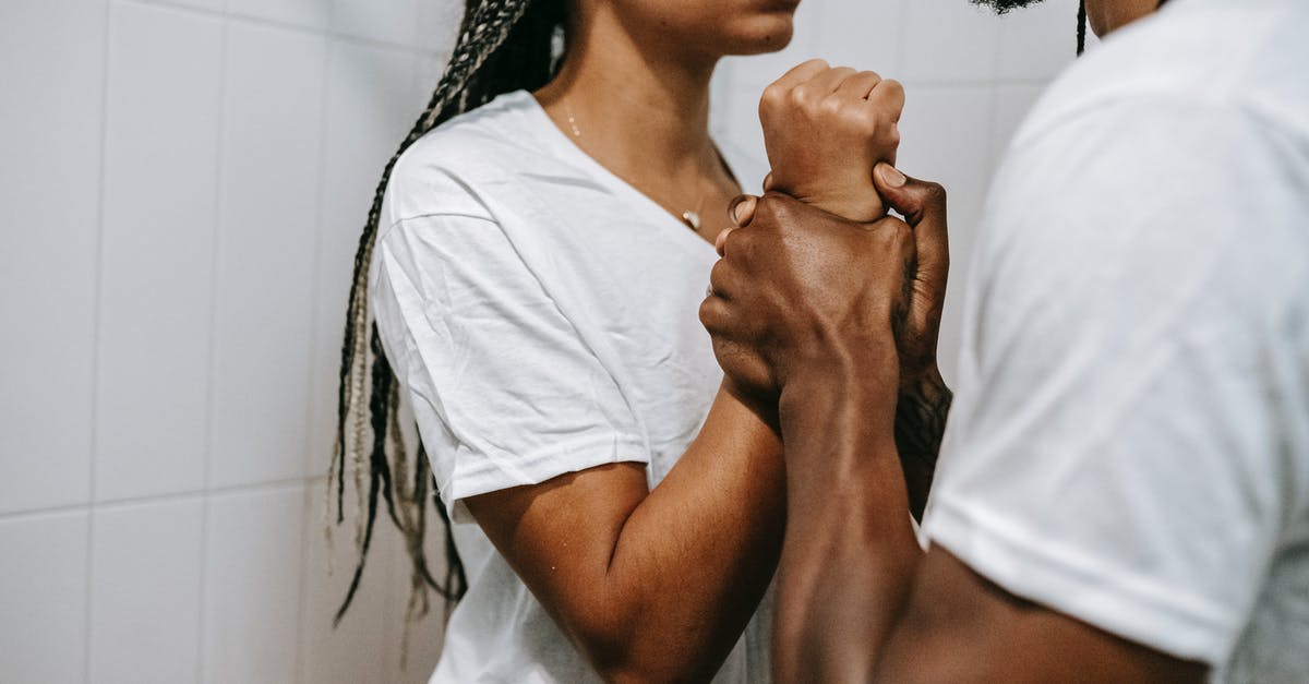 Will Bárðarbunga threaten my vacation? [closed] - Crop anonymous black couple arguing together in bathroom
